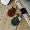 Personalized Full-Grain Leather AirTag Holder & Keyring — Victor — in use