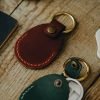 Personalized Full-Grain Leather AirTag Holder & Keyring — Victor — in use