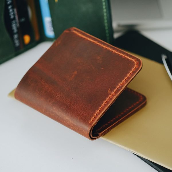 Personalized Minimalist Full-Grain Leather Bifold Wallet — Merih — in use